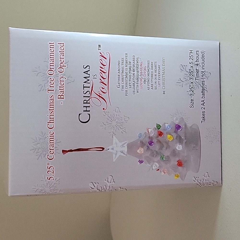 Brand new in a box. Christmas is forever. The Christmas tree is white.